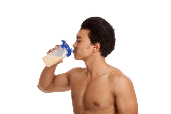 Muscular Asian man drinking whey protein — Stock Photo, Image