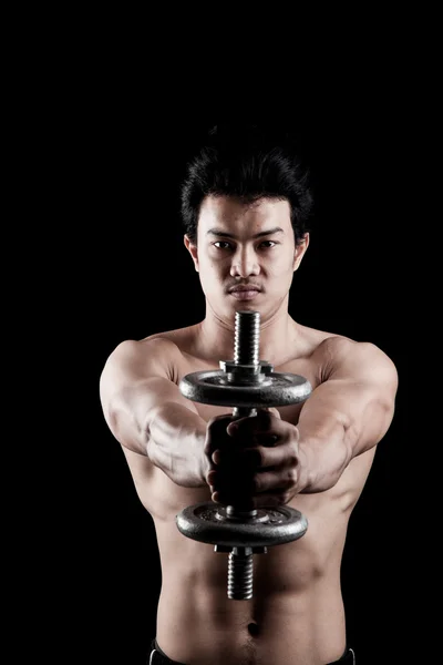 Muscular Asian man with dumbbell — Stock Photo, Image