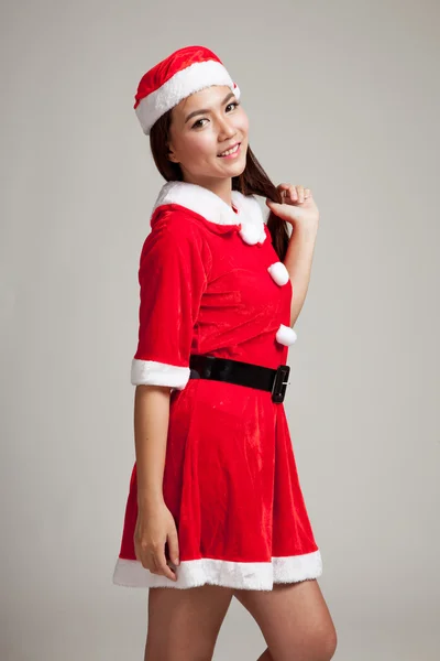 Menina asiática de Natal com roupas de Papai Noel — Fotografia de Stock