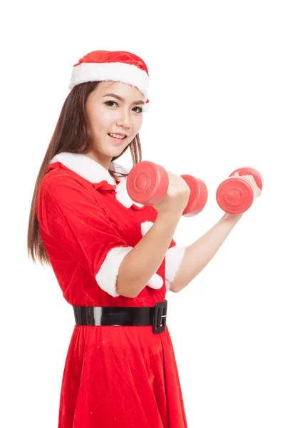 Asiatique fille de Noël avec Santa Claus vêtements et haltères rouges — Photo