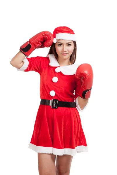 Asiatische Weihnachtsmädchen mit Weihnachtsmann Kleidung und Boxhandschuh — Stockfoto