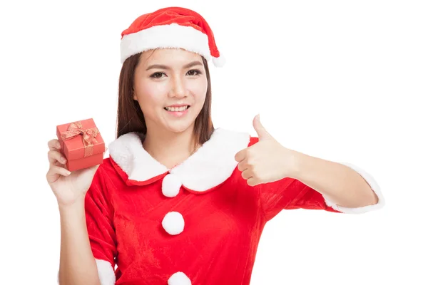 Asian Christmas girl thumbs up with Santa Claus clothes and red — Stock Photo, Image