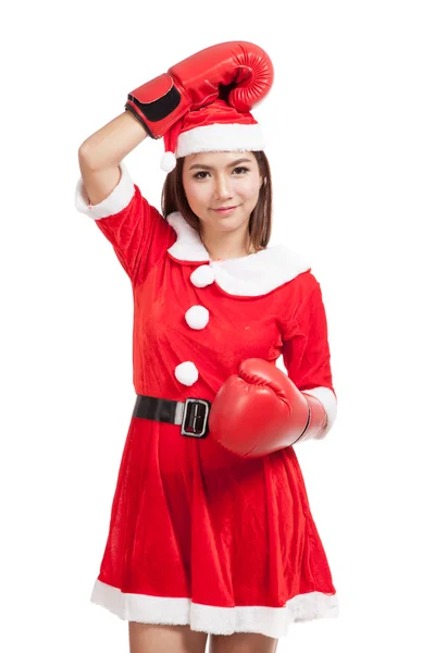 Menina asiática de Natal com roupas de Papai Noel e luva de boxe — Fotografia de Stock