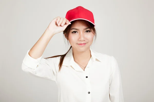 Happy asiatisk flicka med röd hatt — Stockfoto