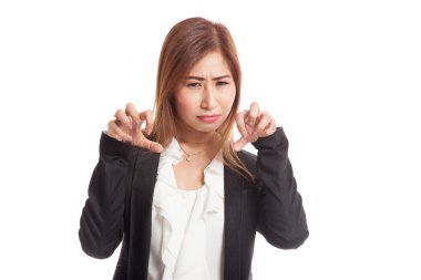 Genç Asyalı işkadını ürkütücü el hareketi ile