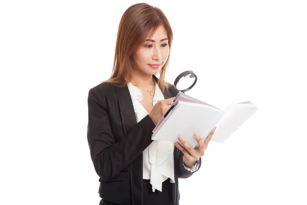 Asian business woman with a book and magnifying glass — Stock Photo, Image