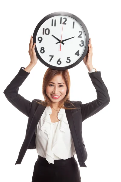 Young Asian business woman with a clock — Stock Photo, Image