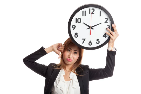 Joven mujer de negocios asiática pulgares abajo con un reloj —  Fotos de Stock