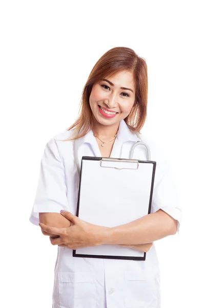 Asian young female doctor hold a clipboard — Stock Photo, Image