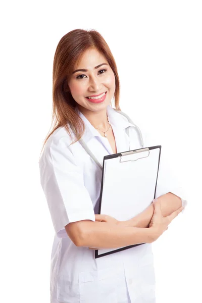 Asian young female doctor hold a clipboard — Stock Photo, Image