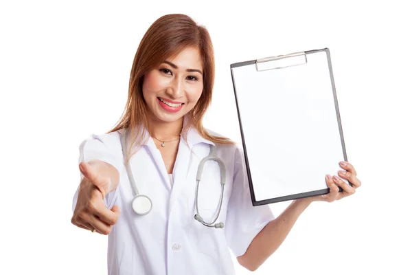 Young Asian female doctor thumbs up with a blank clipboard — Stock Photo, Image