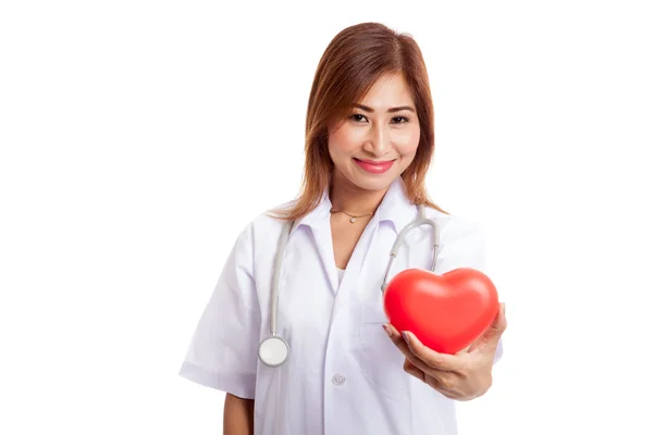 Young Asian female doctor with red heart — Stock Photo, Image