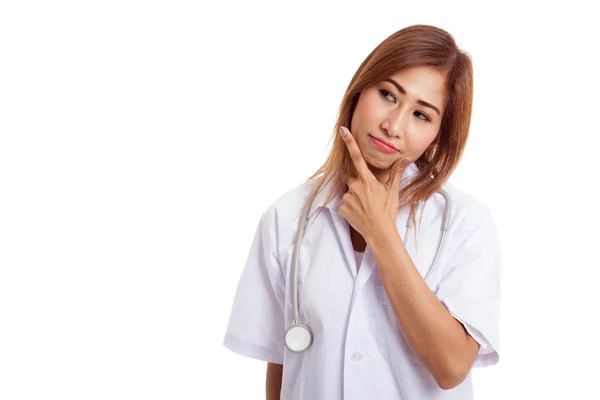 Thoughtful, Young Asian female doctor — Stock Photo, Image