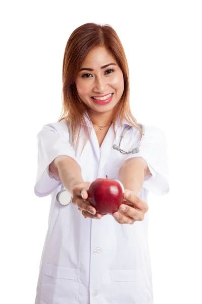 Young Asian female doctor show an apple — Stock Photo, Image