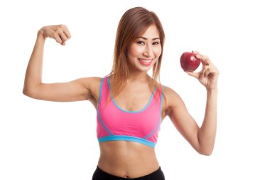 Güzel Asyalı sağlıklı kız pazı Kırmızı elma ile esneme