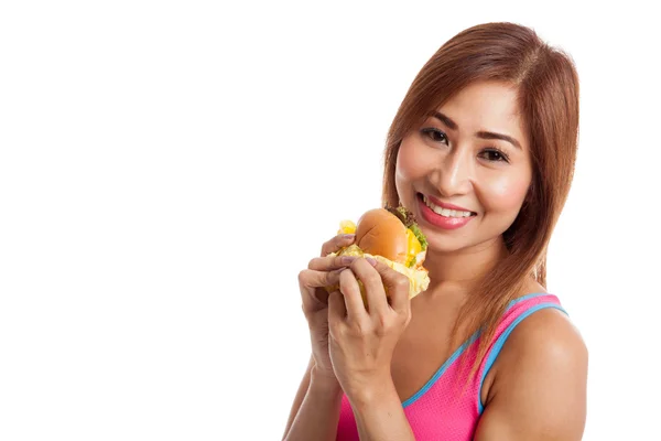 Hermosa chica sana asiática disfrutar de comer hamburguesa — Foto de Stock