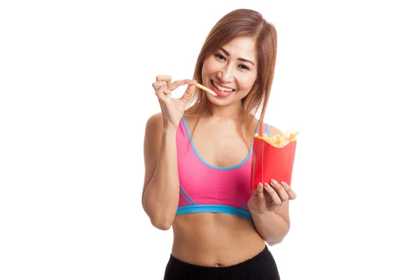 Hermosa chica sana asiática comer papas fritas — Foto de Stock