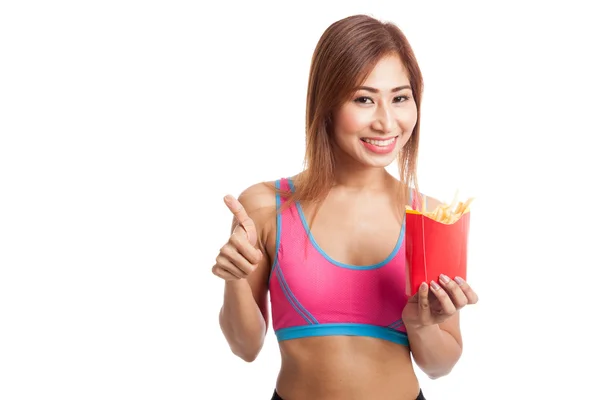 Asiática sana chica comer papas fritas mostrar pulgares arriba — Foto de Stock