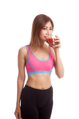 Güzel sağlıklı Asyalı kız içki domates suyu