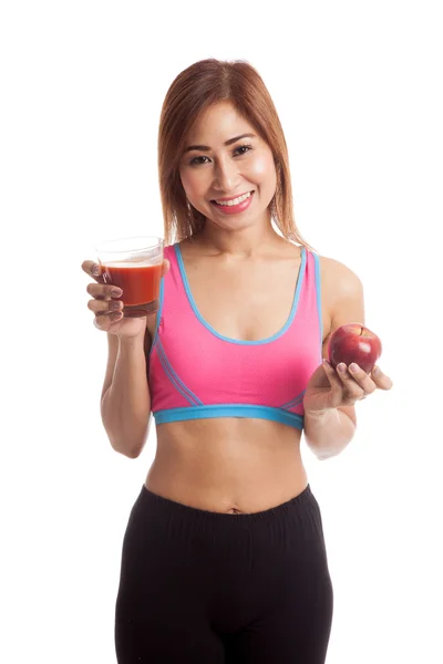 Красивая здоровая азиатка с томатным соком и яблоком — стоковое фото