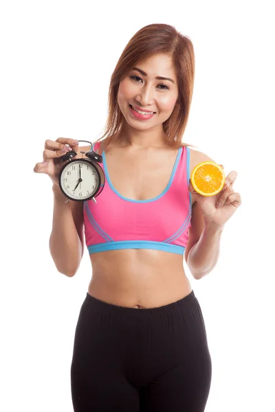 Schöne asiatische gesunde Mädchen mit orange und Uhr — Stockfoto