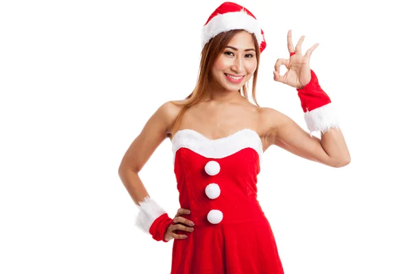 Asiatico Natale ragazza con Babbo Natale vestiti spettacolo OK segno — Foto Stock