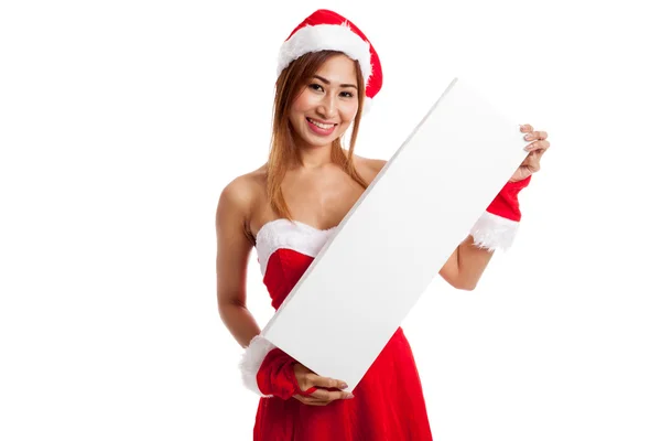 Asian Christmas girl with Santa Claus clothes with blank sign — Stock Photo, Image