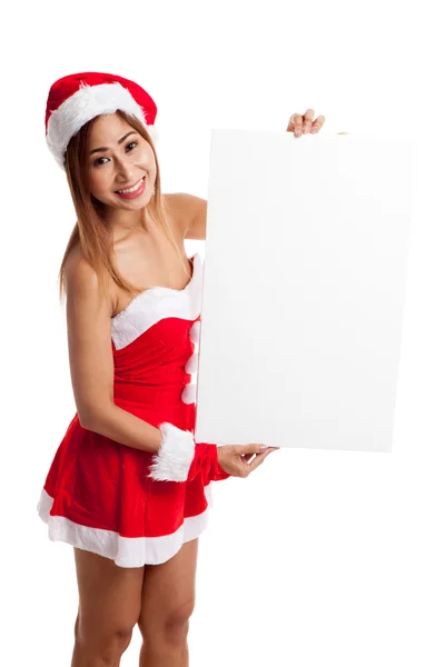 Asiatiska Christmas flicka med Santa Claus kläder med tomma tecken — Stockfoto