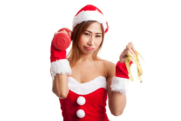 Asiática chica de Navidad con Santa Claus ropa, cinta métrica a — Foto de Stock