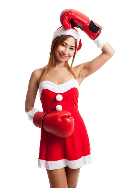 Menina asiática de Natal com roupas de Papai Noel e luva de boxe — Fotografia de Stock