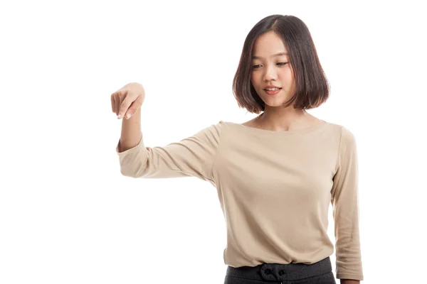 Beautiful young Asian woman point down to blank space — Stock Photo, Image