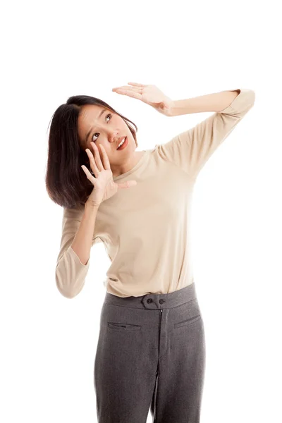 Excited young Asian business woman look up — Stock Photo, Image