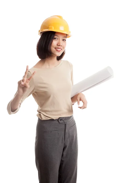 Asian engineer woman with blueprints show victory sign — Stock Photo, Image