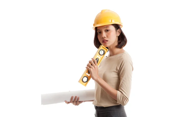 Asian engineer woman with blueprints and level — Stock Photo, Image