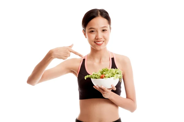 Beautiful Asian healthy girl point to salad — Stock Photo, Image