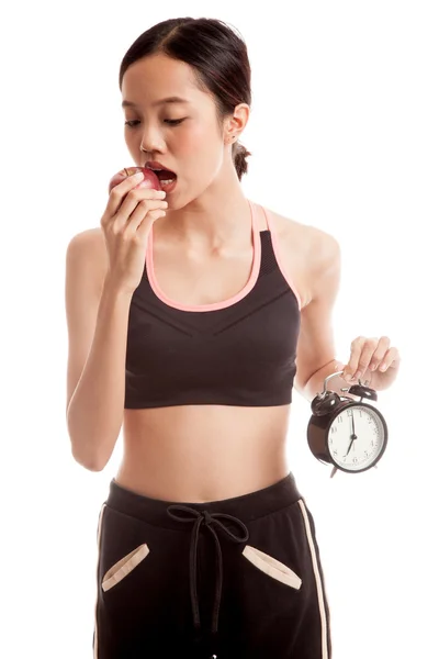 Gyönyörű ázsiai egészséges lány óra és almával — Stock Fotó