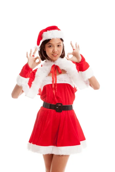アジアのクリスマス サンタ クロース女の子は Ok の標識が表示します。 — ストック写真