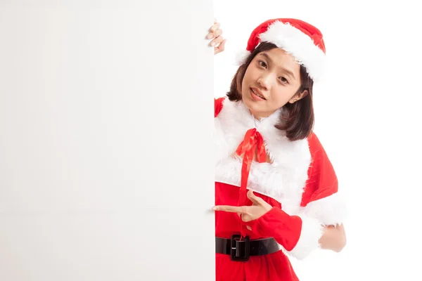Dziewczyna azjatyckich Boże Narodzenie Santa Claus Wskaż pusty znak — Zdjęcie stockowe