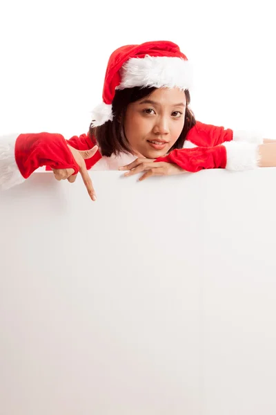 Asiático Navidad santa claus chica punto abajo a blanco signo — Foto de Stock