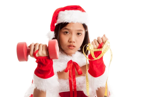 Asiático Natal Papai Noel menina com fita métrica e dumbbel — Fotografia de Stock