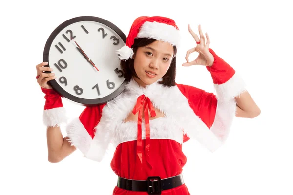 Asian Christmas Santa Claus girl  show OK with clock at midnight — Stock Photo, Image