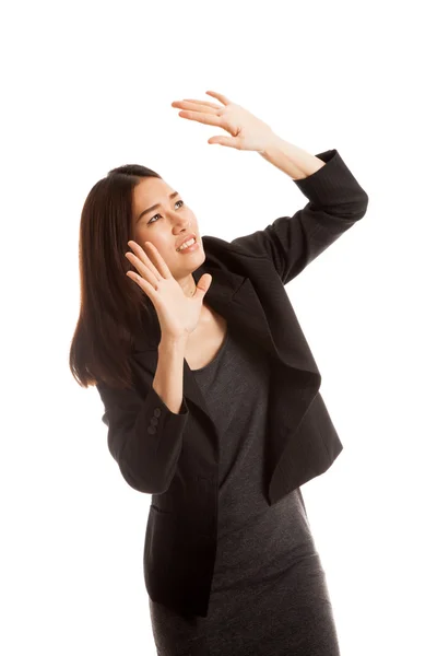 Excited young Asian business woman look up. — Stock Photo, Image