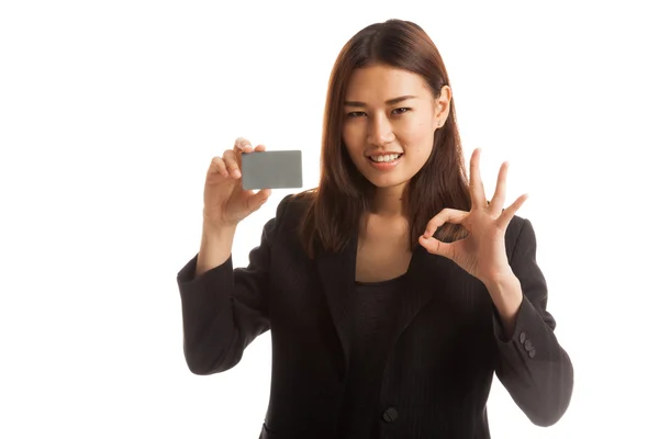 Young Asian business woman show OK with a blank card. — Stock Photo, Image