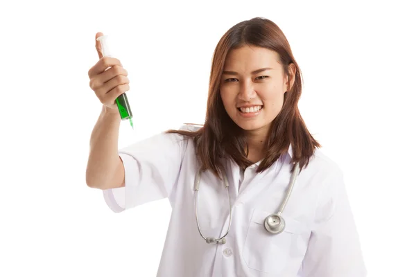 Crazy Young Asian female doctor hold a syringe. — Stock Photo, Image