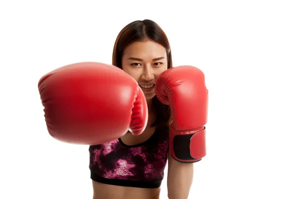 Beautiful healthy Asian girl with red boxing glove. — Stock Photo, Image