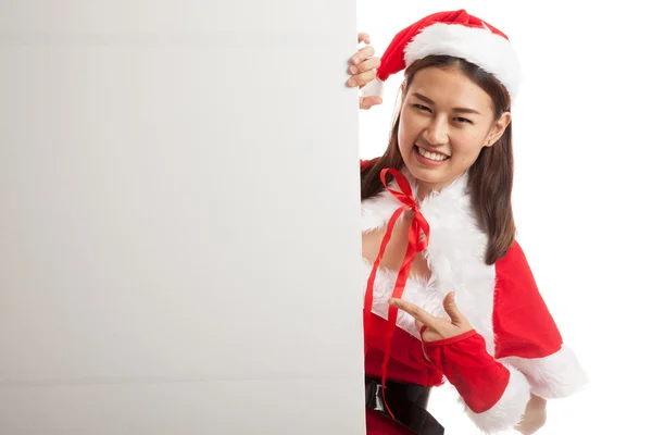 Asiático Navidad santa claus chica punto a blanco signo . —  Fotos de Stock