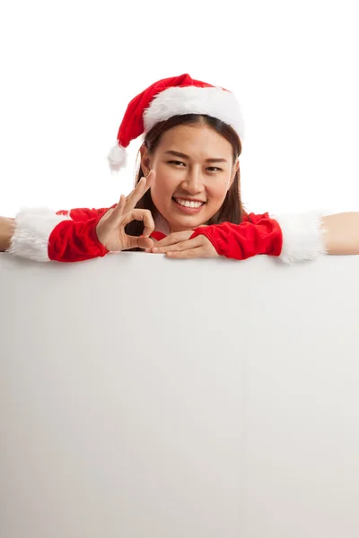 Asian Christmas Santa Claus girl show OK with blank sign. — Stock Photo, Image