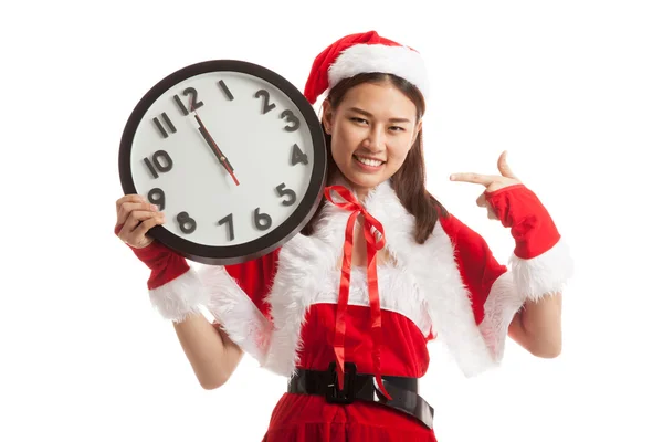 Asiático Navidad santa claus chica punto a reloj a la medianoche . —  Fotos de Stock