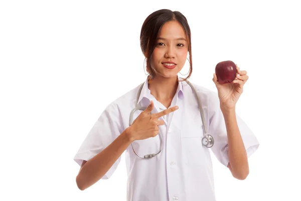 Młodych azjatyckich kobiet lekarza punkt do apple — Zdjęcie stockowe