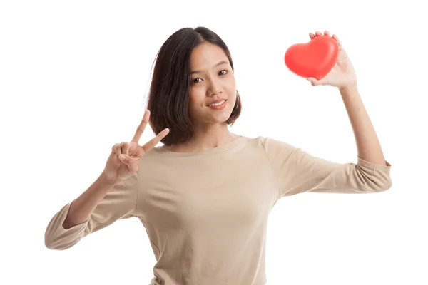 Asian business woman show victory sign with red heart — Stock Photo, Image